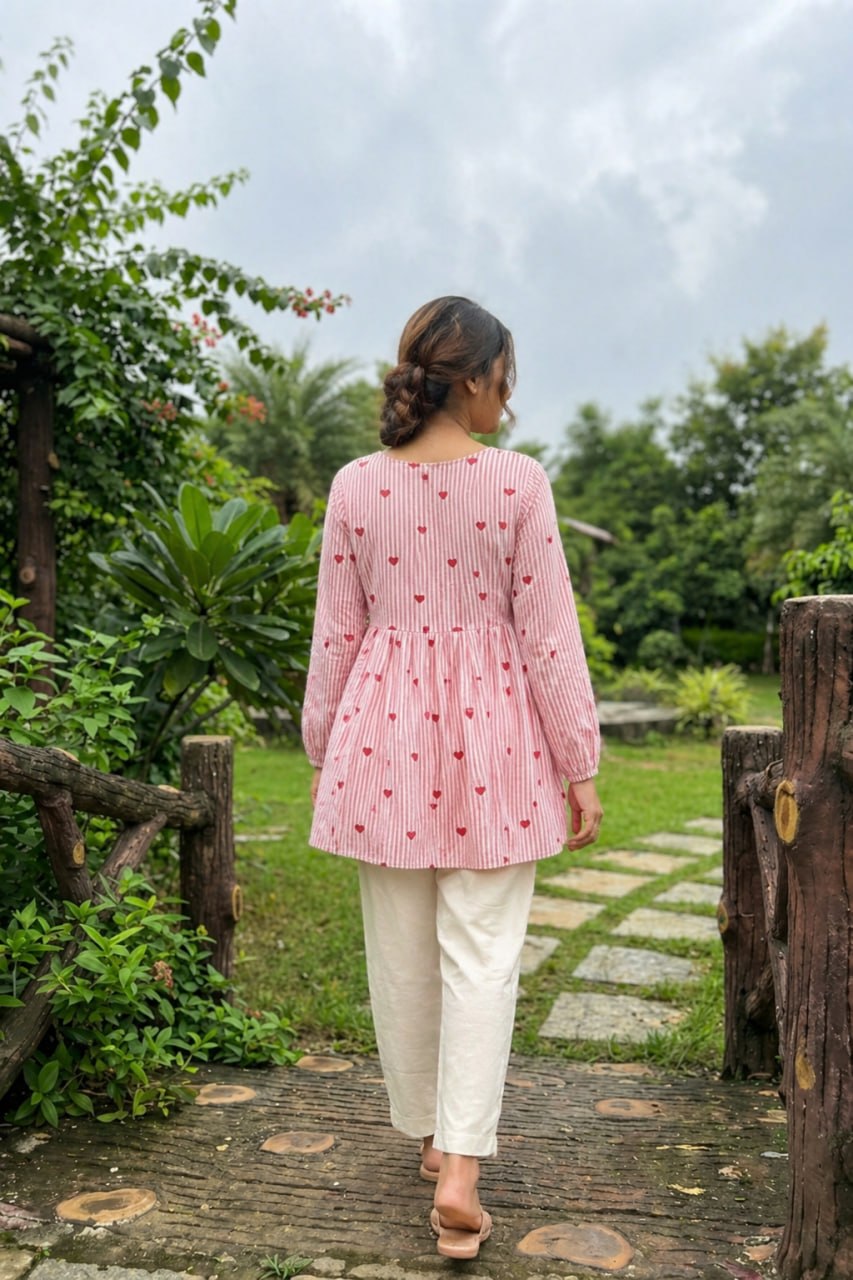 Pink Heart Print Peplum Kurti with White Straight Pants